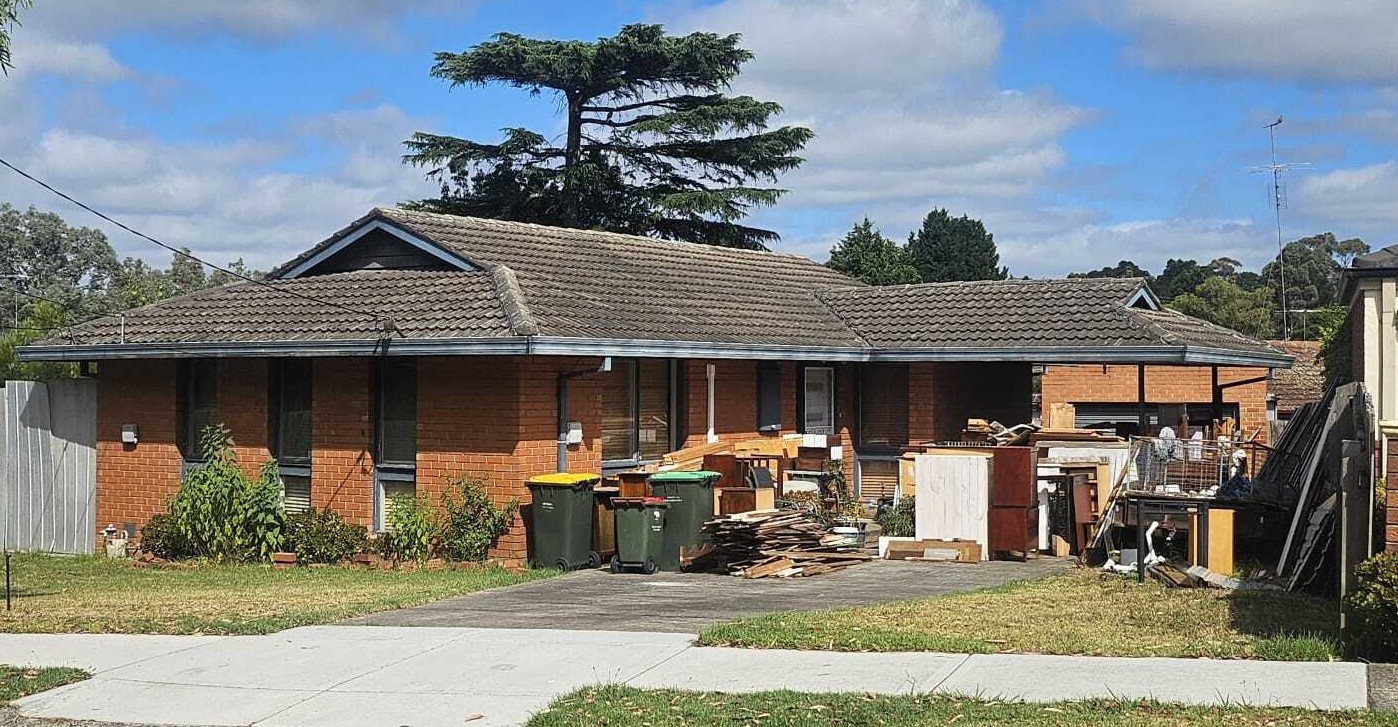 old furniture in front of house